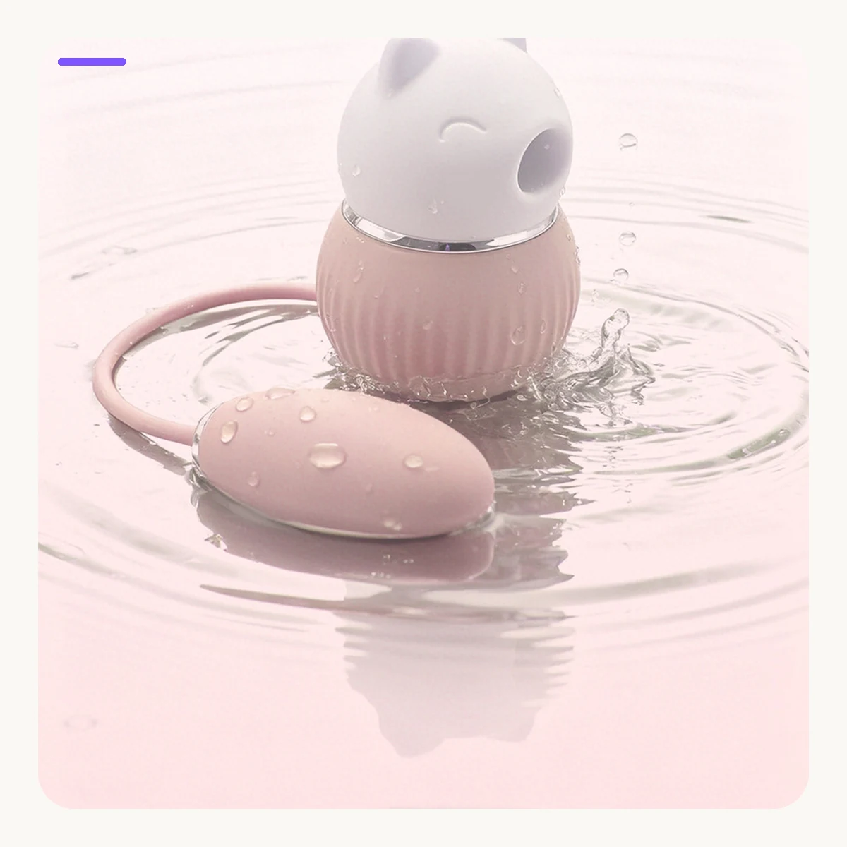 Pink Kitty Duo vibrator presented with rinseable water-care guidance
