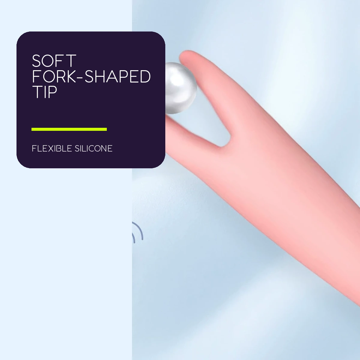 Close-up of the pink flexible fork-shaped silicone tip shown around a round display prop.